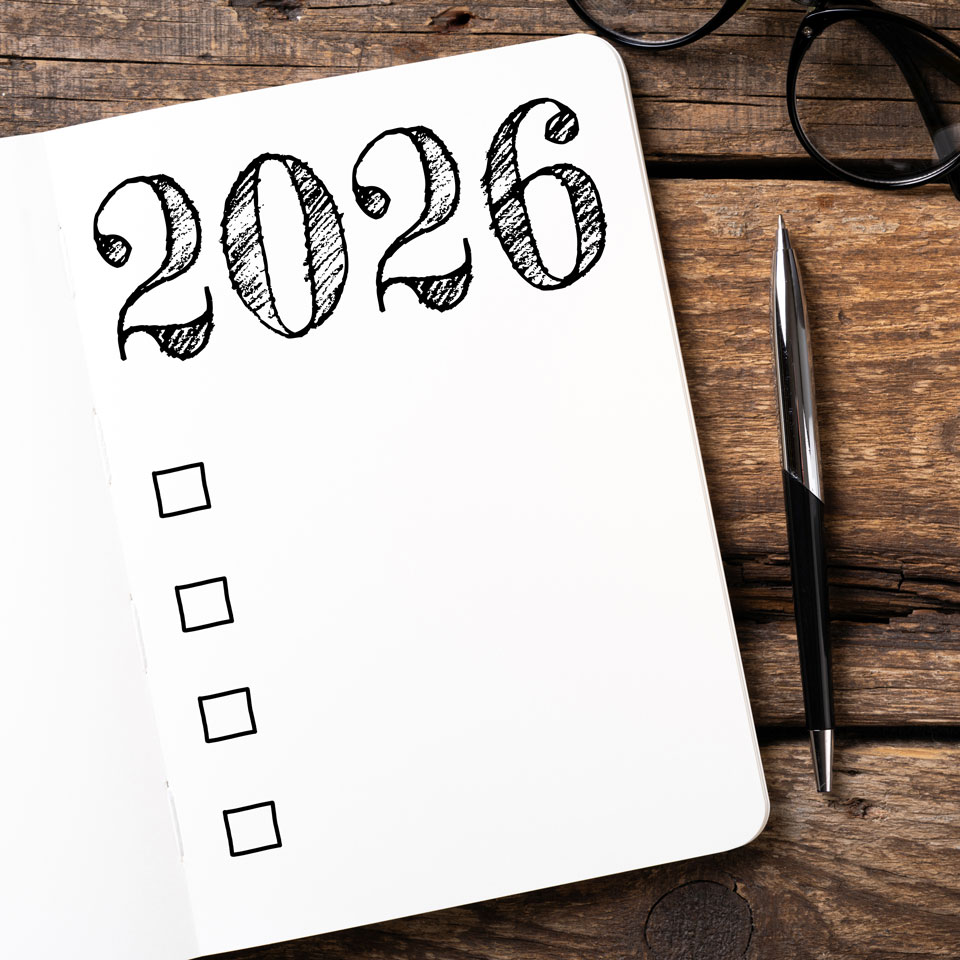 An open notebook with 2026 written in it and an empty checklist underneath
