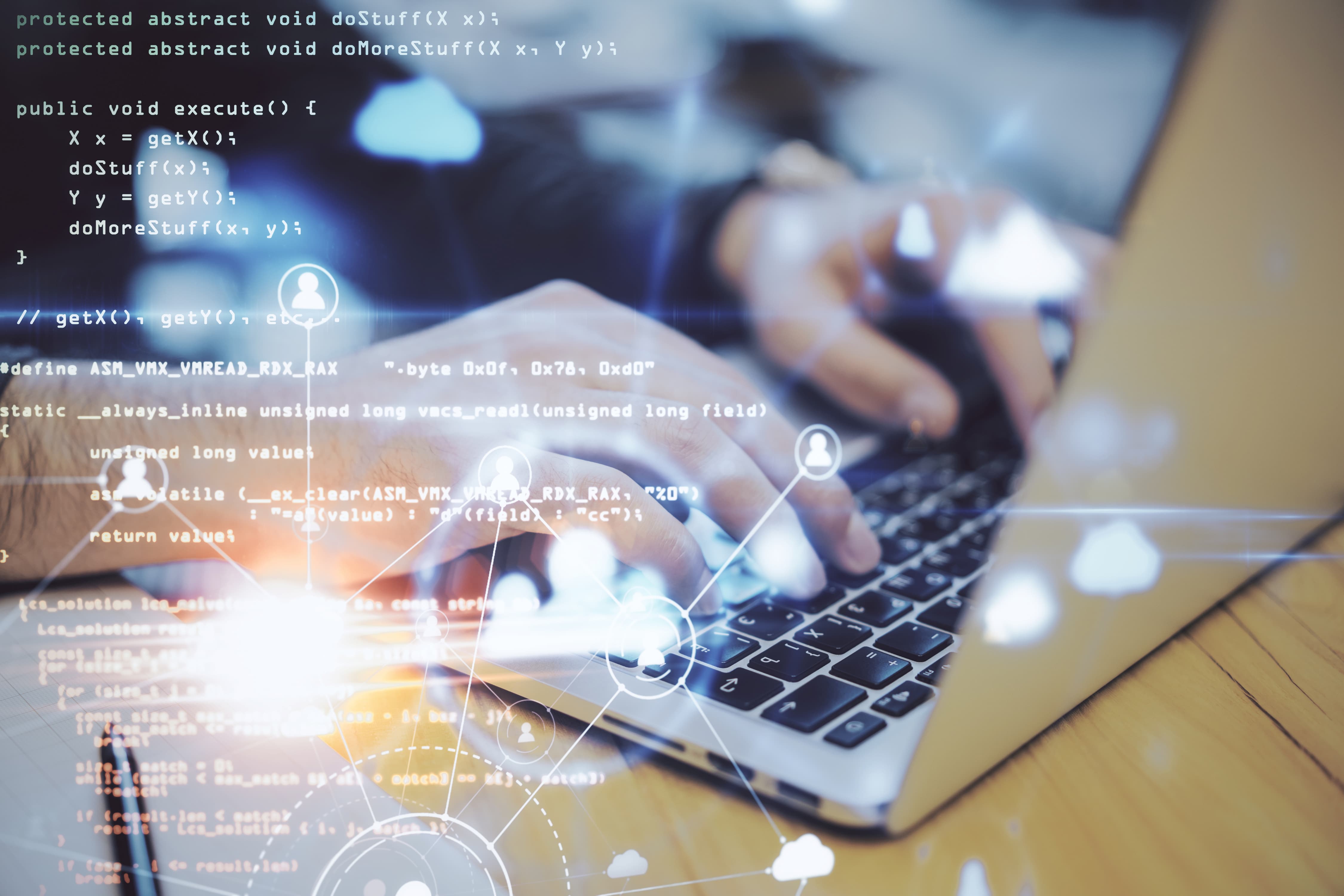 An edited image with a layer of code transposed over a photo of hands typing on a laptop