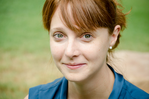 Portrait photo of woman with red hair