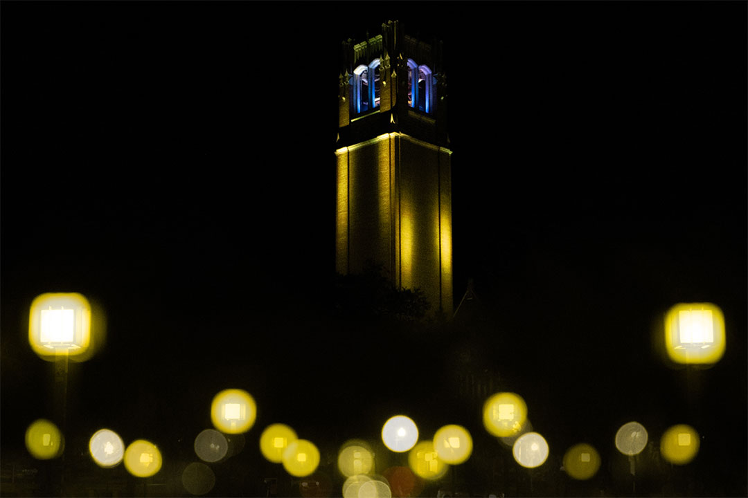 UF's Century Tower is lit in the blue and yellow, the colors of the Ukrainian flag.