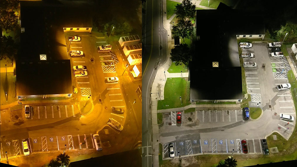 A side-by-side aerial shot of the same parking lot with right one demonstrating improved illumination due to recent lighting upgrades.