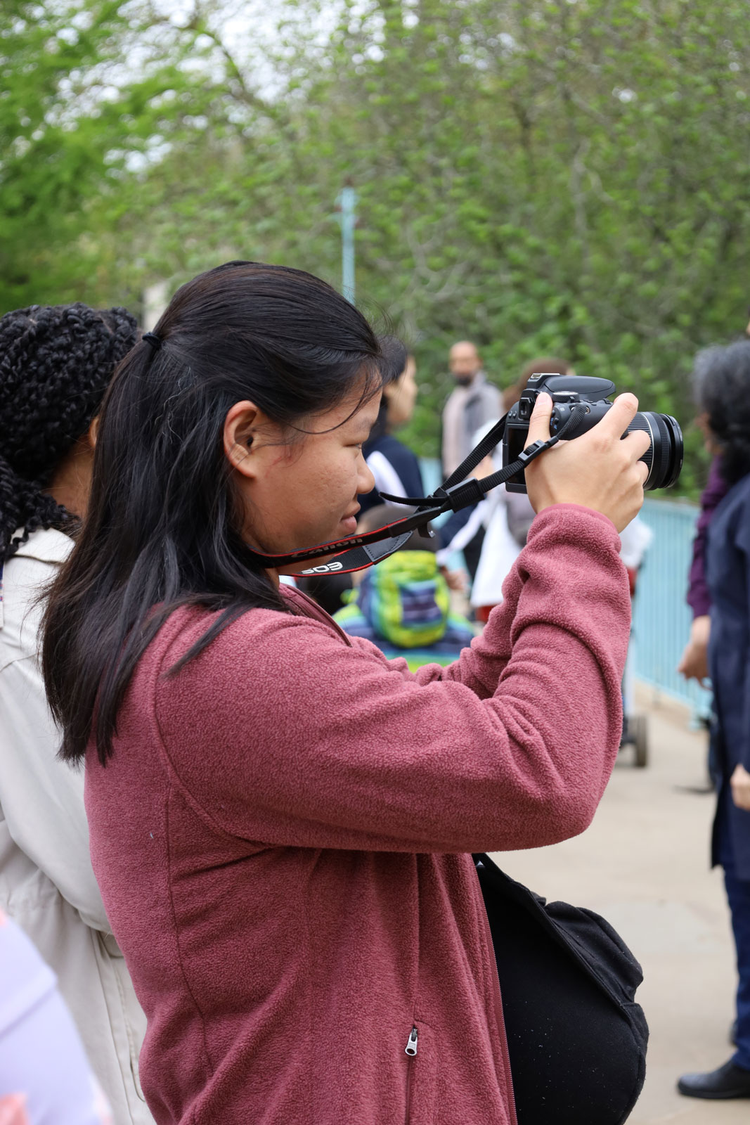 Student takes a picture of her surroundings in London
