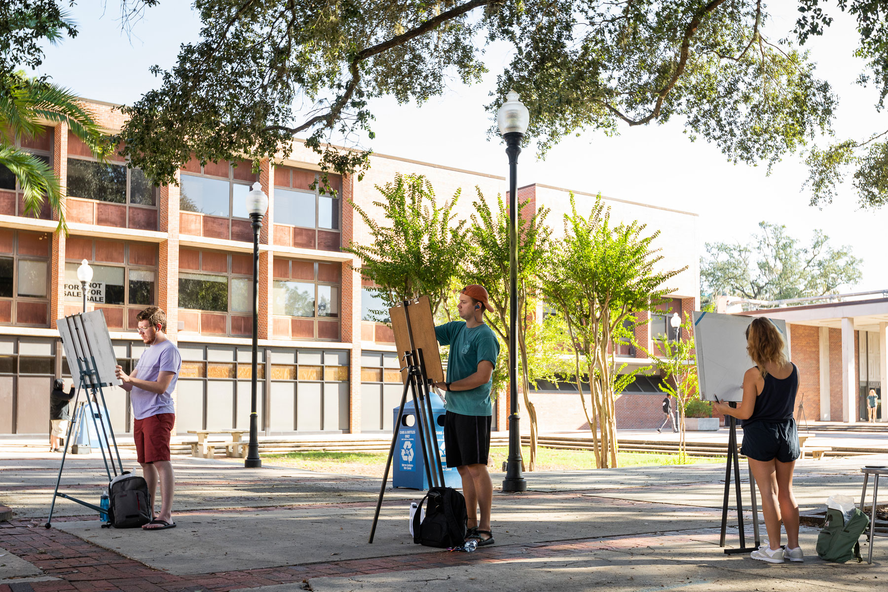 University of Florida College of the Arts students enjoying their perceptual drawing course outdoors on campus