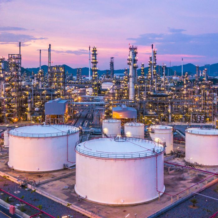 An oil refinery at dusk