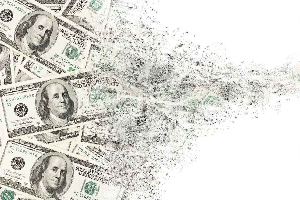 An illustration of several hundred dollar bills that dissolve into nothingness