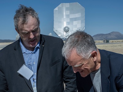 NSF NRAO Director Tony Beasley (left) and UF Astraeus Space Institute Director Robert Ferl (right) sign the MOU between NRAO and UF at an event celebrating the debut of the ngVLA prototype. Credit: NSF/AUI/NSF NRAO.