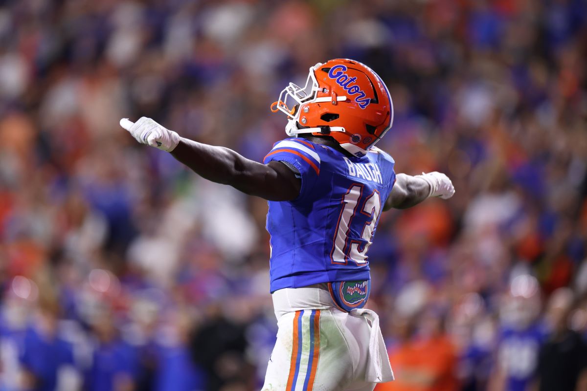 A Gator athlete celebrates on the football field