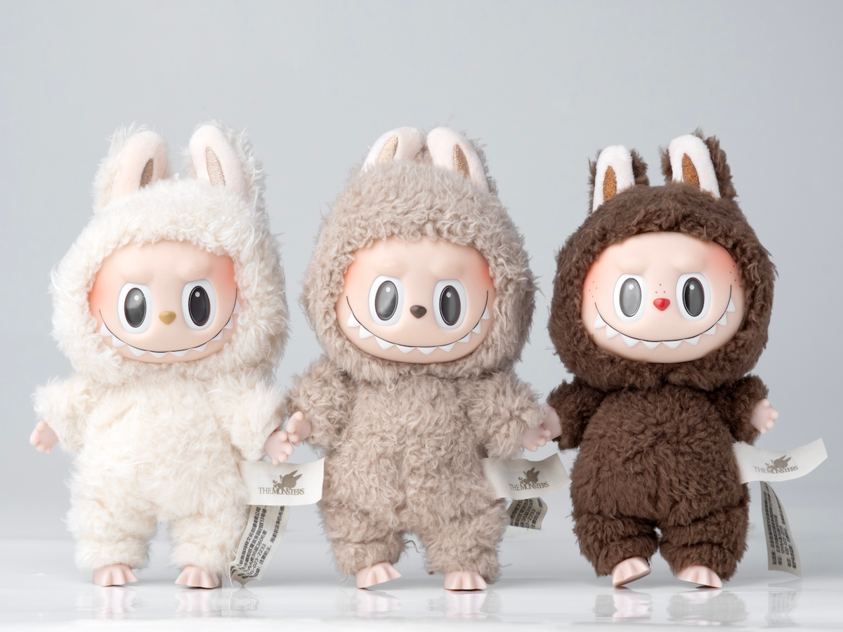 Three Labubu dolls stood up in a line
