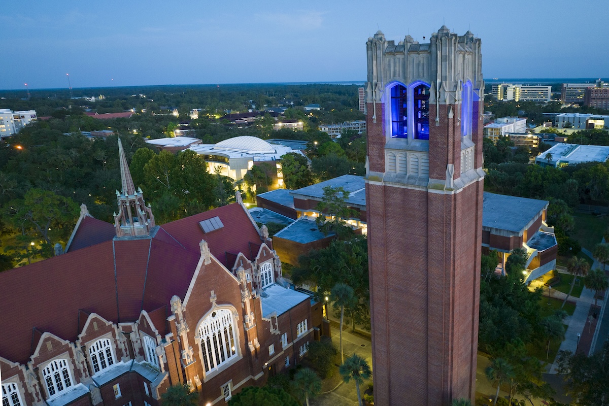 an evening photo of UF campus from above
