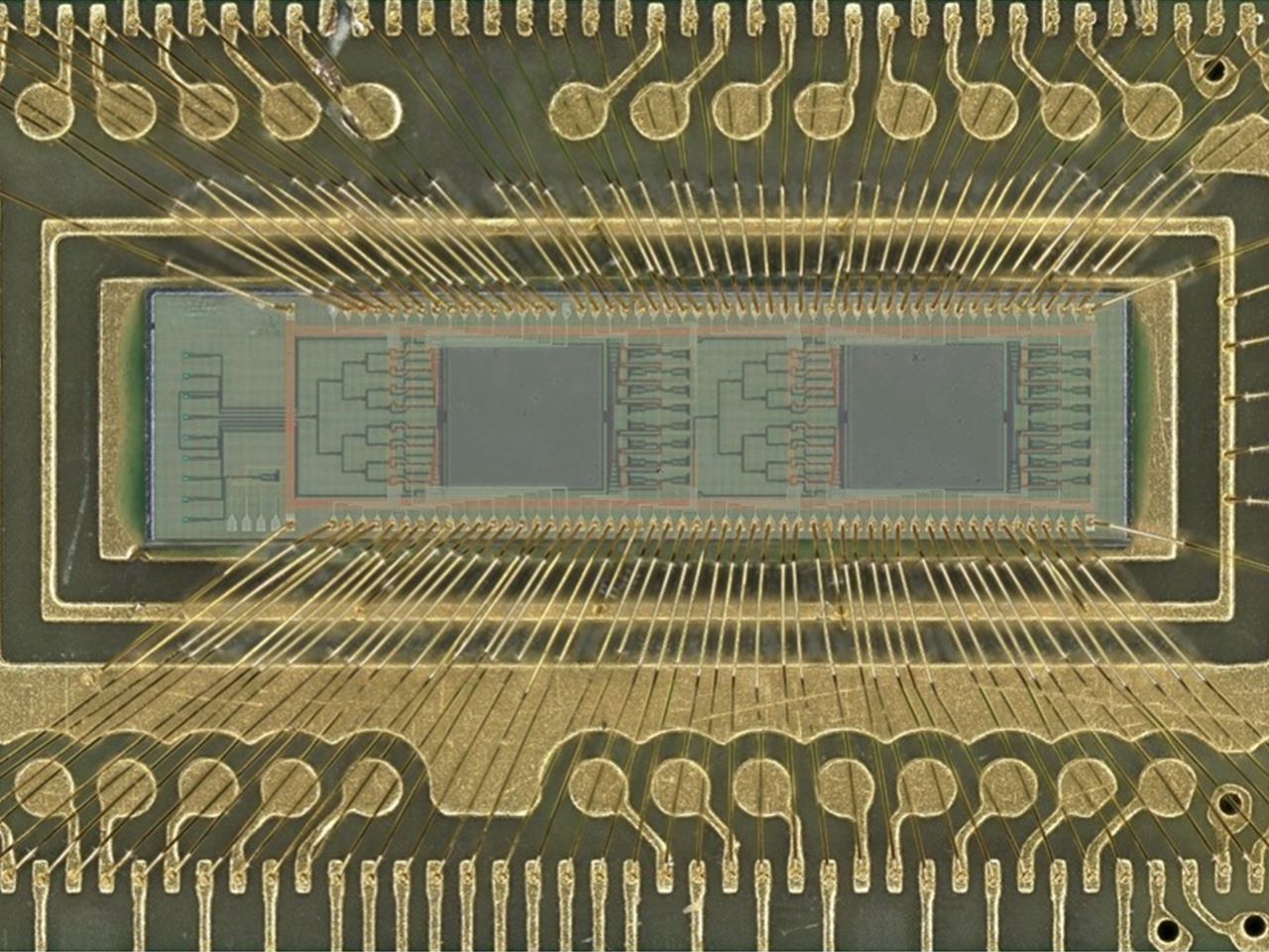 A golden colored semiconductor chip viewed close up