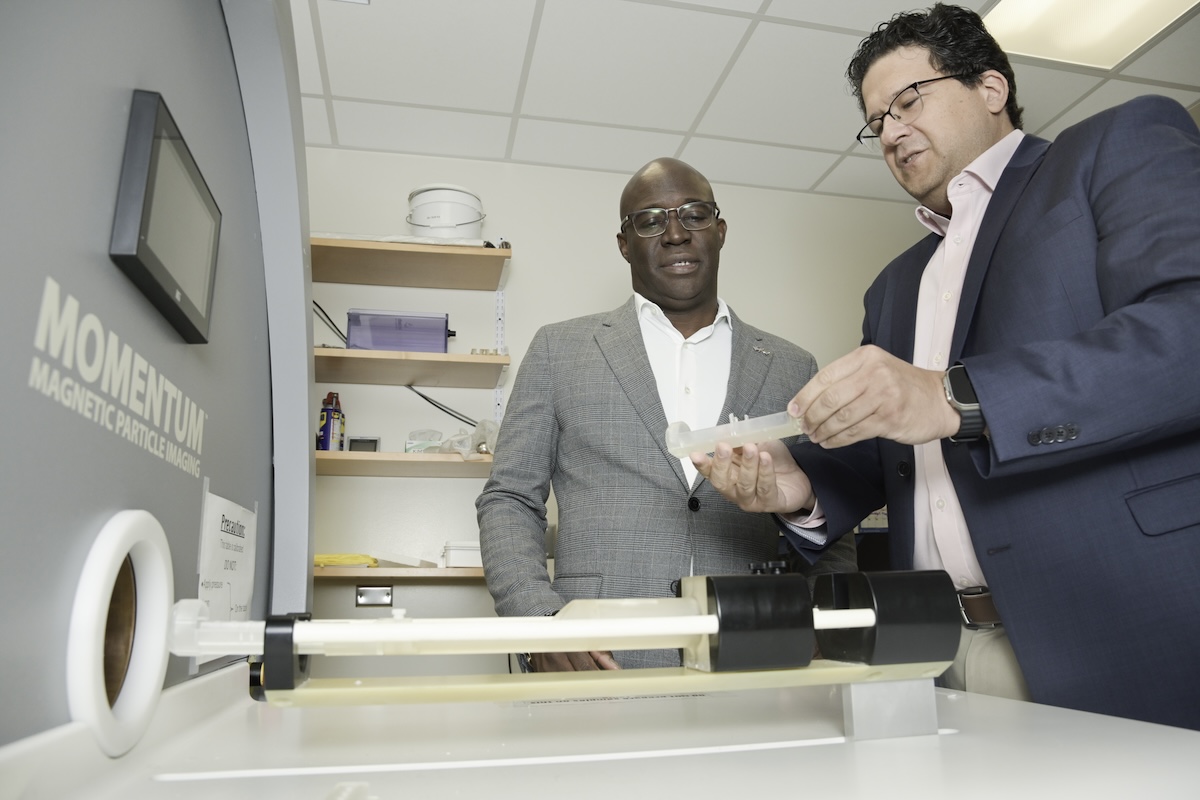 Researchers Duane Mitchel and Carlos Rinaldi-Ramos pose