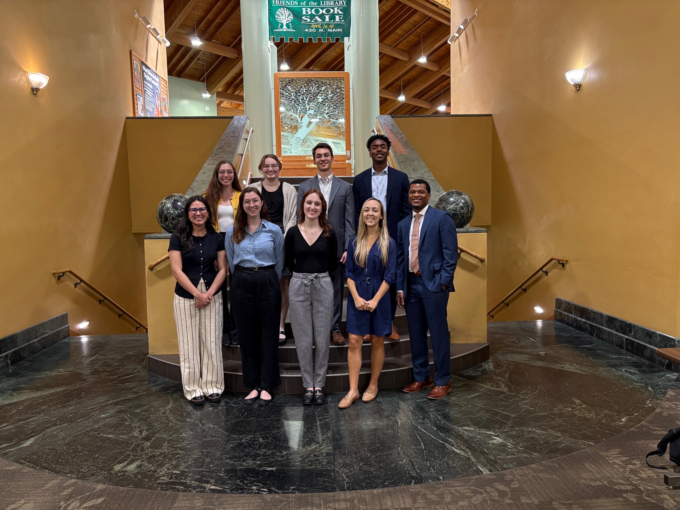 A group of students who work at the Heirs Property Clinic standing in two lines