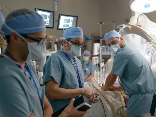 Dr. Michael Okun and his team during surgery